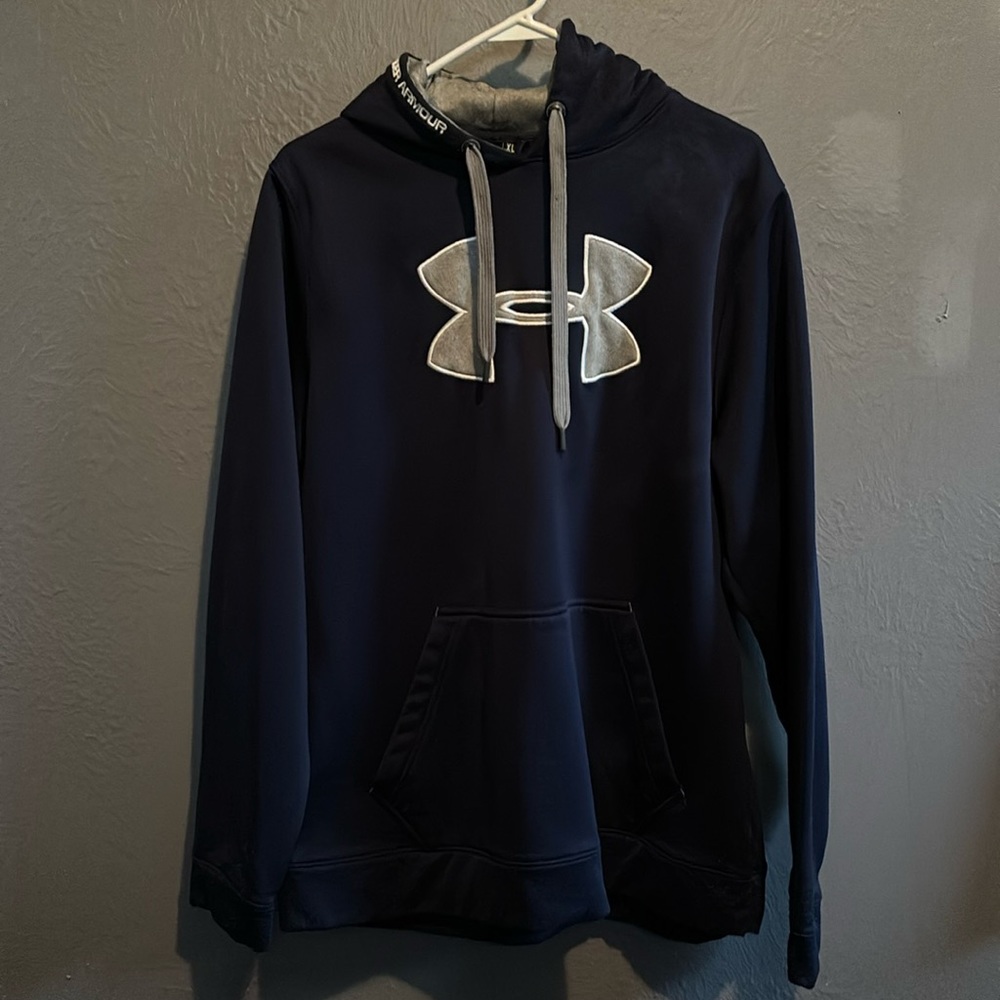 Navy blue with silver accents. Great gently used sweatshirt.